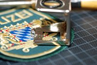 Stickerei eines Polizeilogos